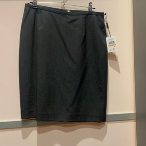 Dark grey Calvin Klein suit skirt. Versatile and sophisticated. New, tags on